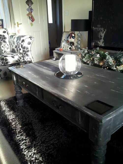 coffee table after being painted by the little handcrafted company